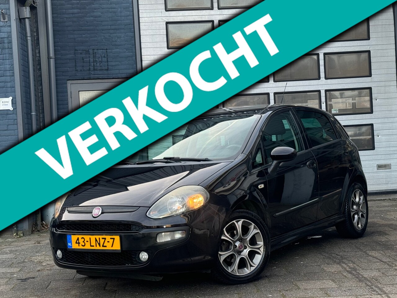 Fiat Punto Evo - 1.4 Racing | Airco | Cruise | PDC | 5-DRS - AutoWereld.nl