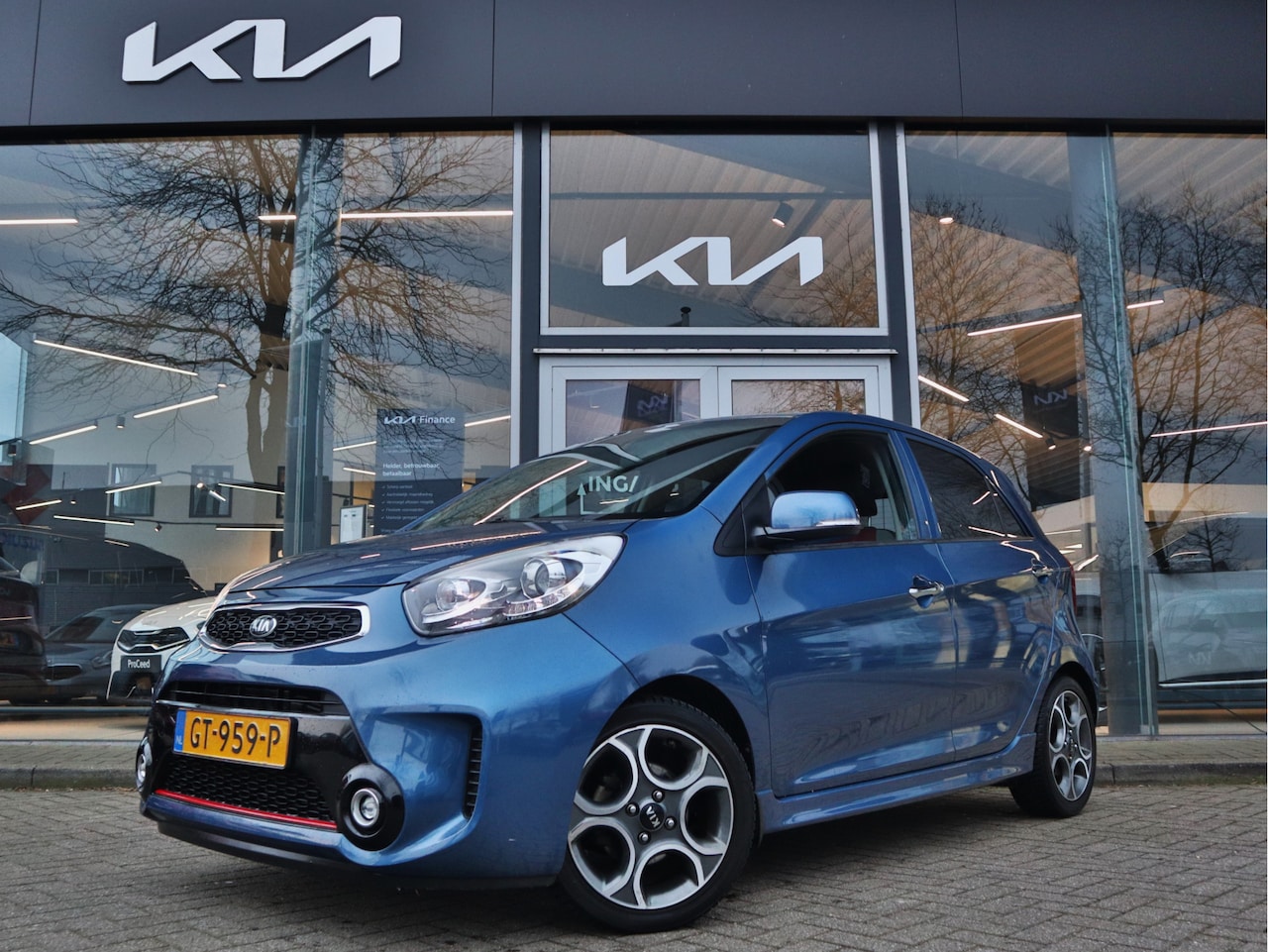 Kia Picanto - 1.2 CVVT SportsLine Cr.Control Stoel+Stuurverw. Airco Keyless LED 15"LMV - AutoWereld.nl