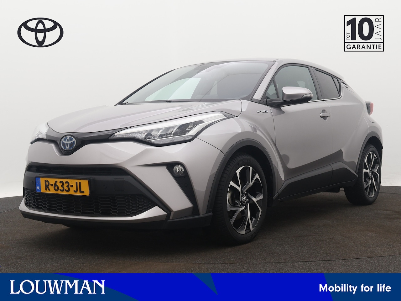 Toyota C-HR - 1.8 Hybrid Style | Stoel en stuurwiel verwarmd | Parkeersensoren | Camera | LM velgen | Cr - AutoWereld.nl