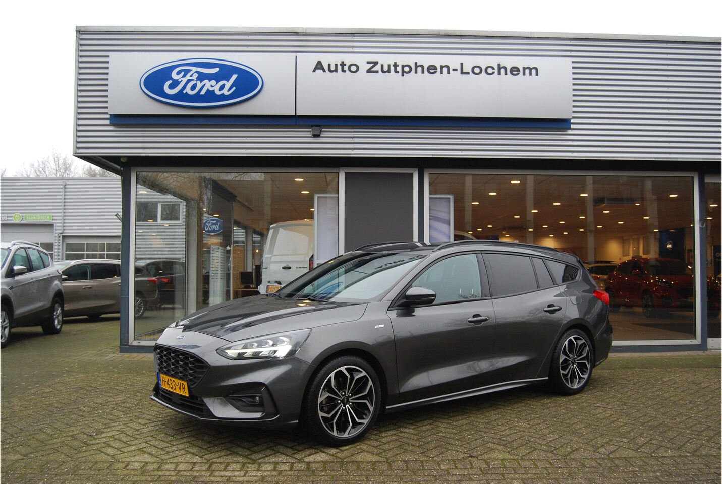 Ford Focus Wagon - 1.0 EcoBoost 125 PK ST Line Business NL-AUTO | WINTERPACK | ELEKTR. TREKHAAK | 18" INCH |F - AutoWereld.nl