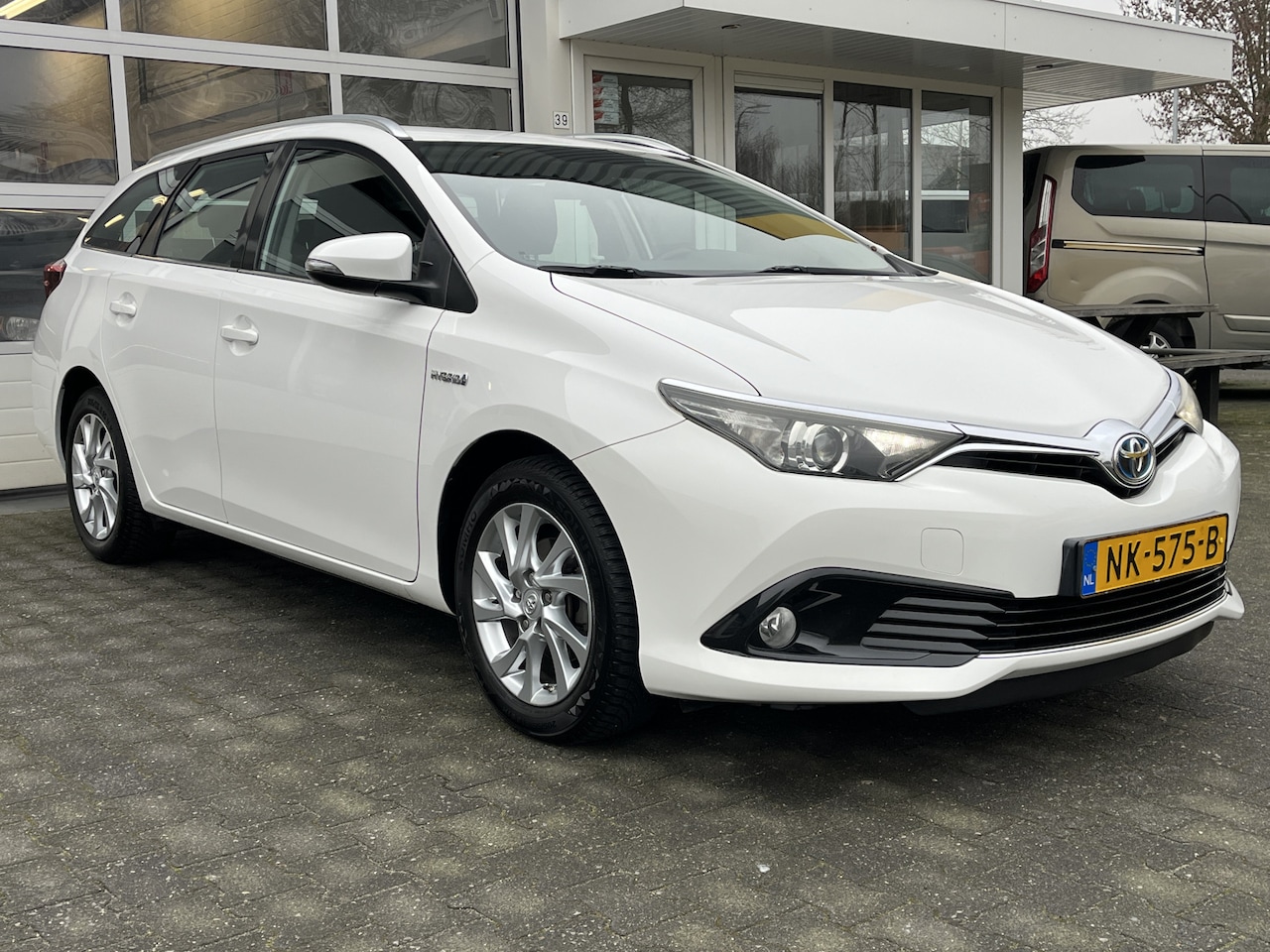 Toyota Auris Touring Sports - 1.8 Hybrid Aspiration Camera Cruise control Climate control Trekhaak - AutoWereld.nl