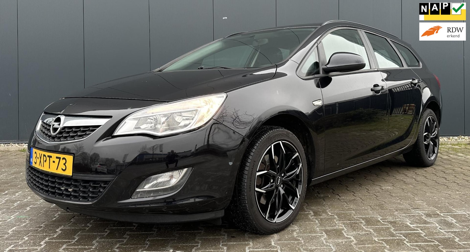 Opel Astra Sports Tourer - 1.7 CDTi Edition Airco Cruise Navi Trekhaak - AutoWereld.nl