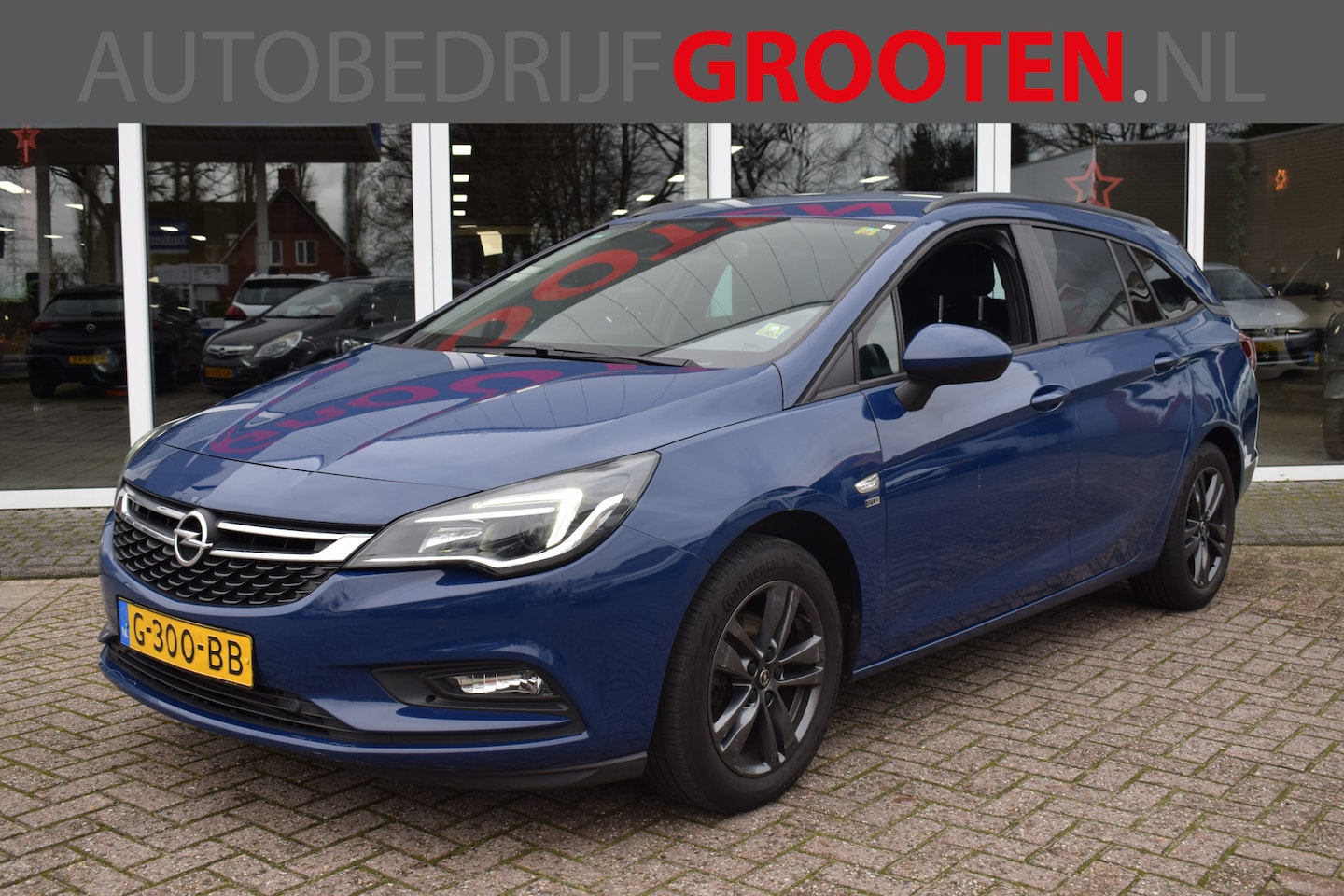 Opel Astra Sports Tourer - 1.4 Turbo 120 Jaar Edition//NAVI//150PK!! - AutoWereld.nl