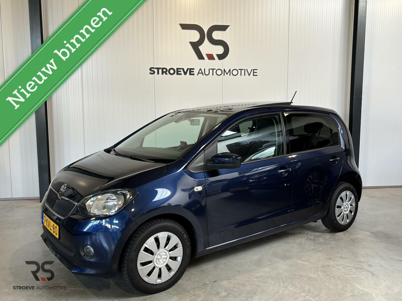 Skoda Citigo - 1.0 MPI 60 pk handg. Greentech Elegance | Airco | Pano | Stoelverw. | Tel. | Navi Maps&Mor - AutoWereld.nl