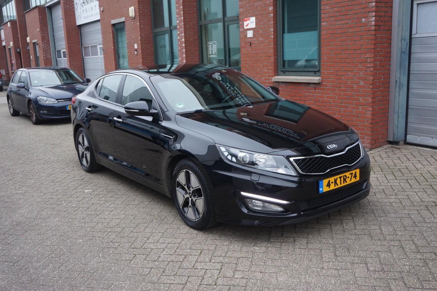 Kia Optima - 2.0 CVVT Hybrid Super Pack Leer, Memory, Navi ! - AutoWereld.nl