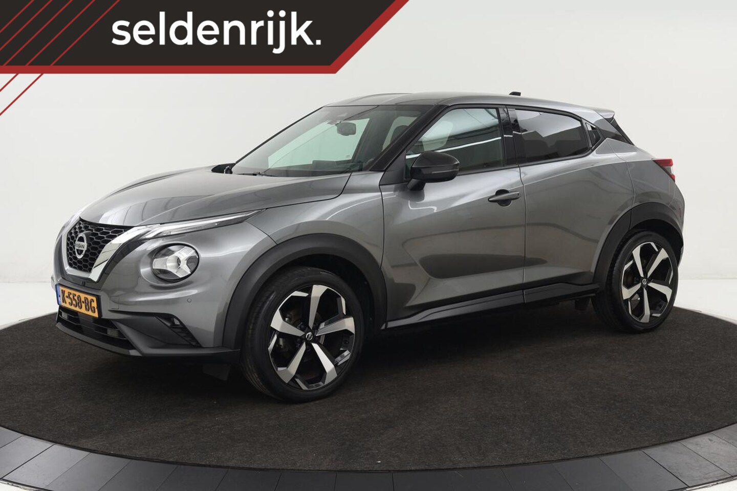 Nissan Juke - 1.0 DIG-T Tekna | Automaat | Stoelverwarming | 360 camera | Trekhaak | Bose Sound | Naviga - AutoWereld.nl