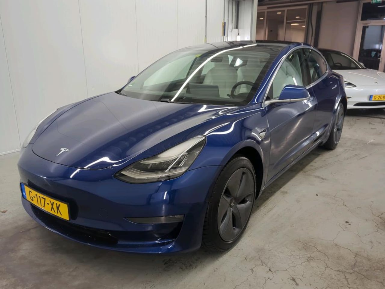 Tesla Model 3 - Long-Range AWD 351pk 75 kWh [ TREKHAAK+AUTOPILOT+620KM WLTP+PREMIUM AUDIO ] - AutoWereld.nl