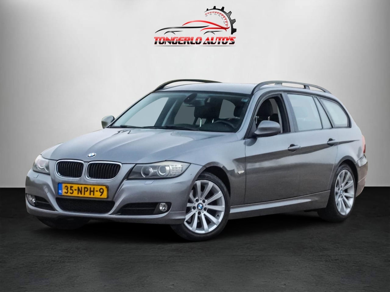 BMW 3-serie Touring - 318i Business Line Clima Navi 17`` lm Leer - AutoWereld.nl