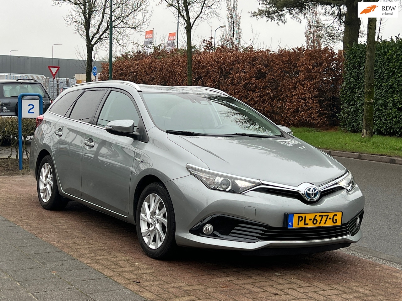 Toyota Auris Touring Sports - 1.8 Hybrid Dynamic *DLR. ONDERHOUDEN - AutoWereld.nl