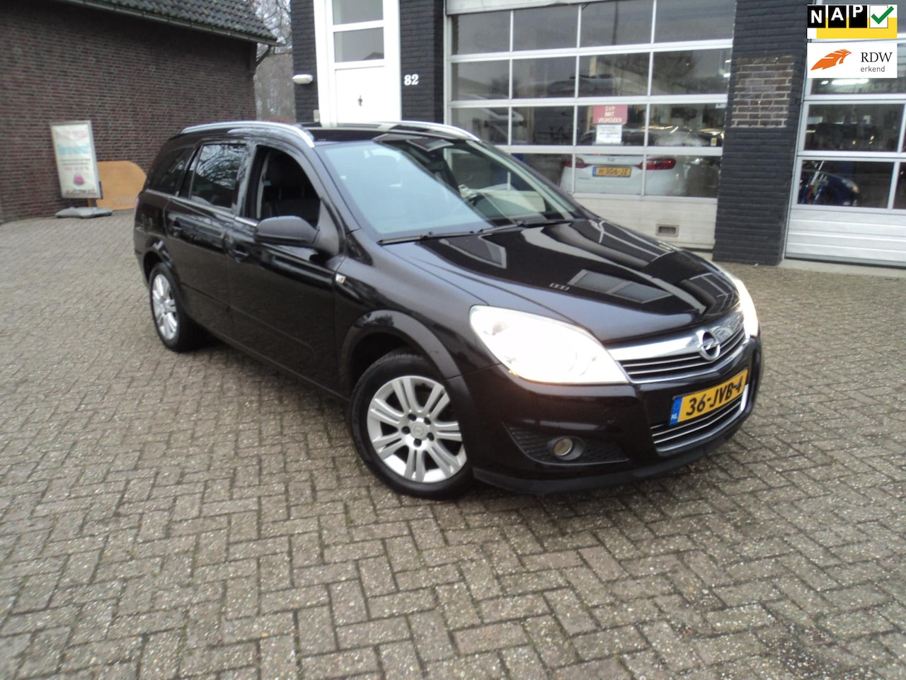 Opel Astra Wagon - 1.6 Cosmo Stoelverwarming Trekhaak Leren bekleding - AutoWereld.nl