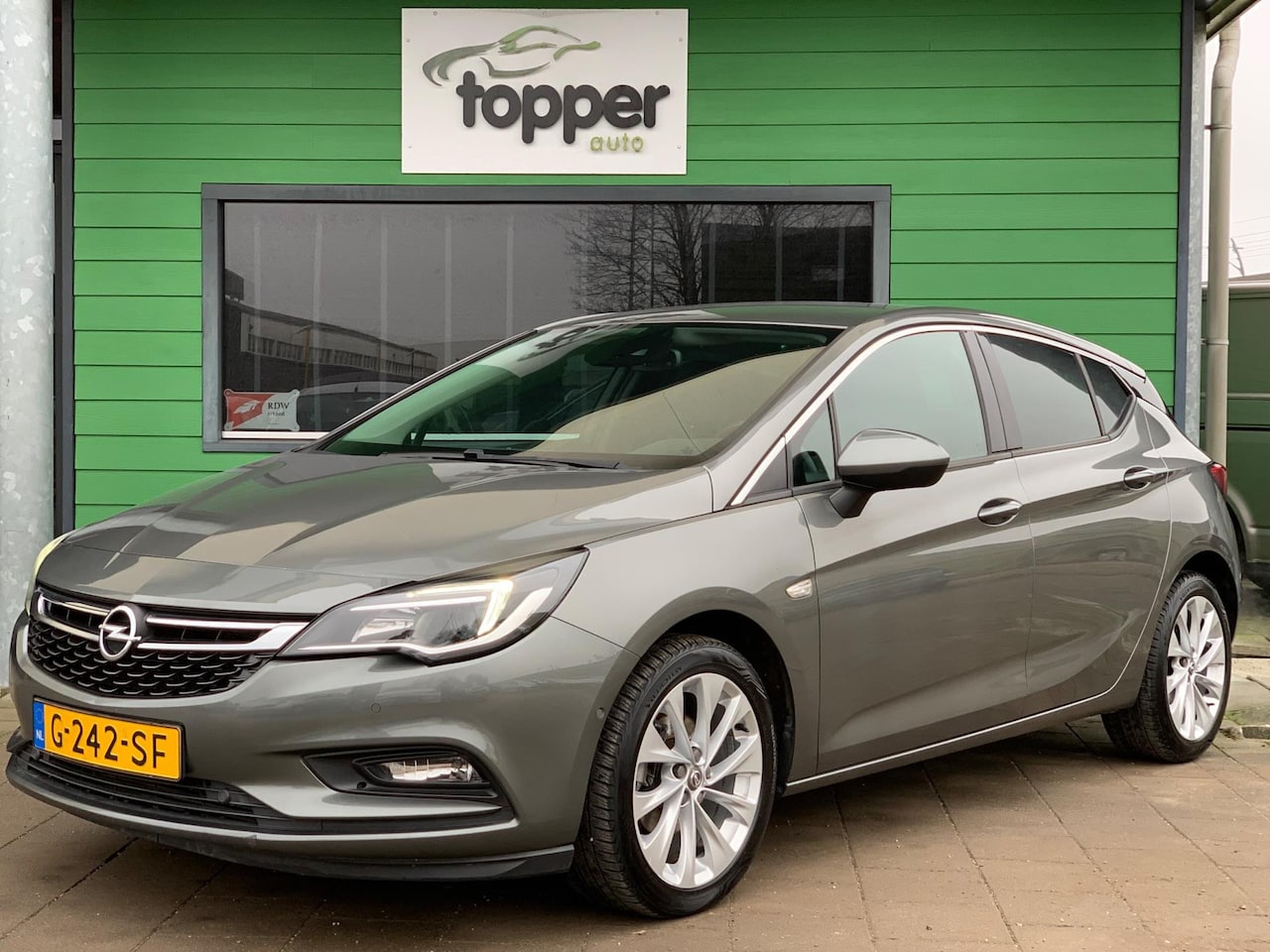 Opel Astra - 1.4 Turbo Business Executive / Automaat / Camera / Navigatie / - AutoWereld.nl