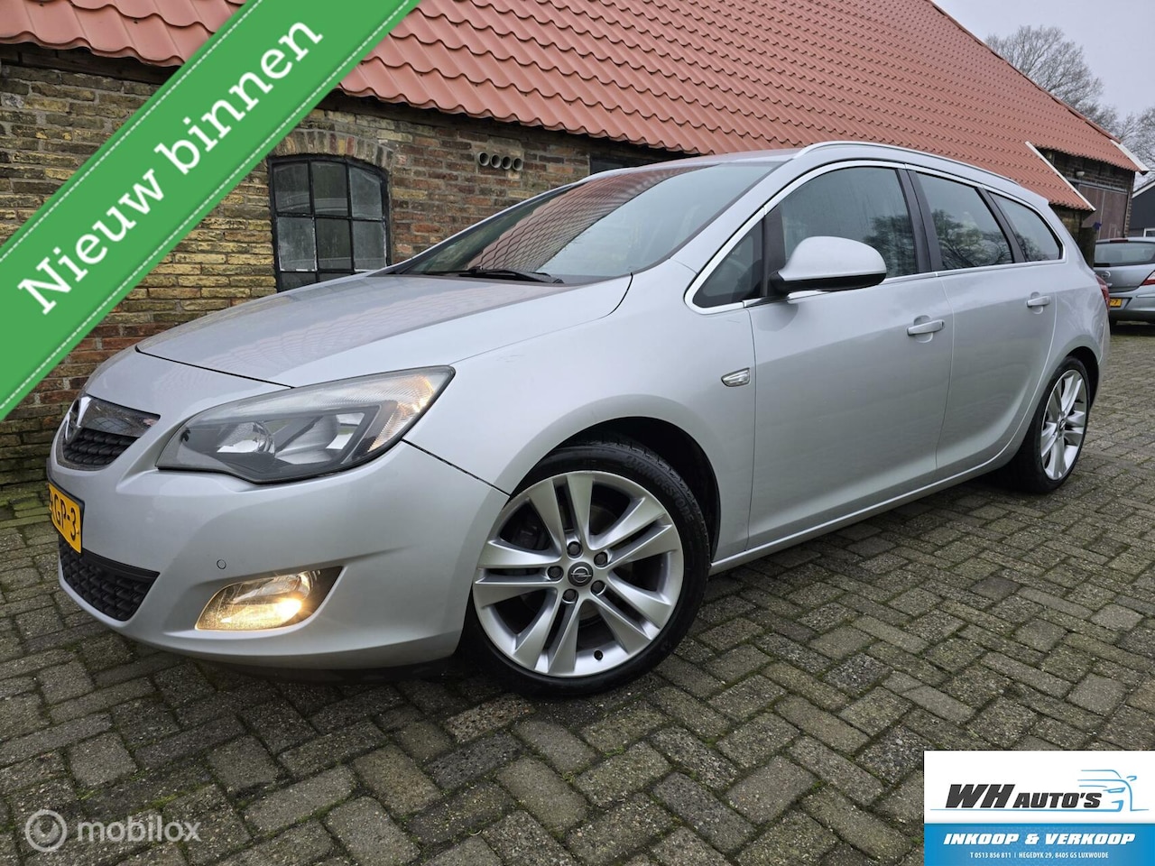 Opel Astra Sports Tourer - 1.6 Turbo Sport 1.6 Turbo Sport - AutoWereld.nl