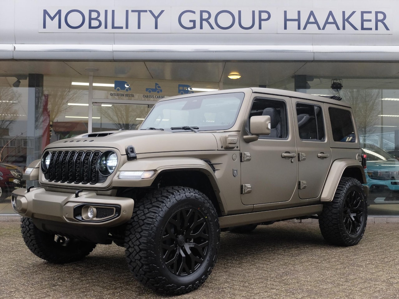 Jeep Wrangler Unlimited - 4xe 380 Sahara BRUTE CUSTOM I Plug In Hybrid I Mat BRUTE CUSTOM I Plug In Hybrid I Mat Bro - AutoWereld.nl