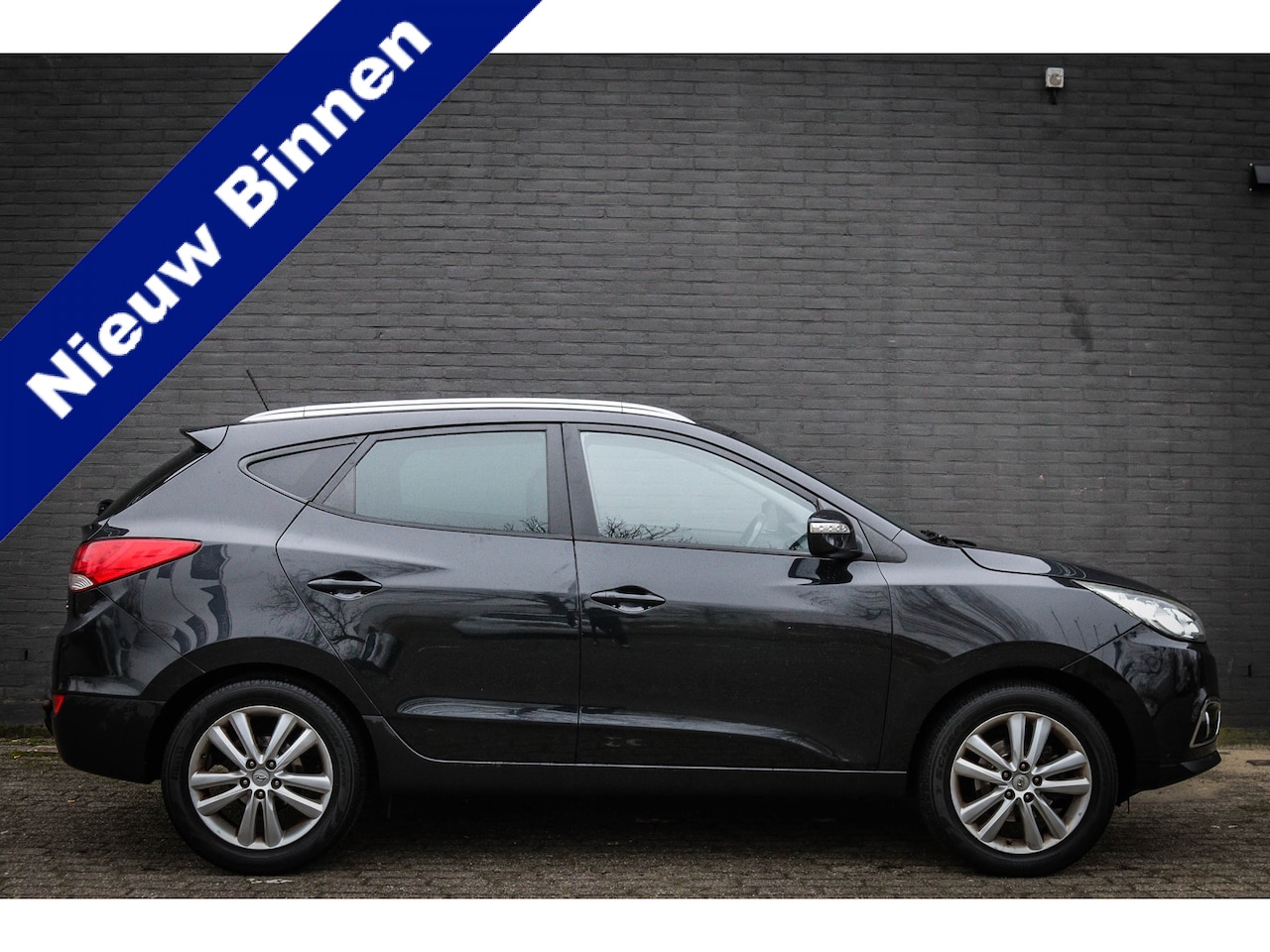 Hyundai ix35 - 2.0i i-Catcher Net binnen! - AutoWereld.nl