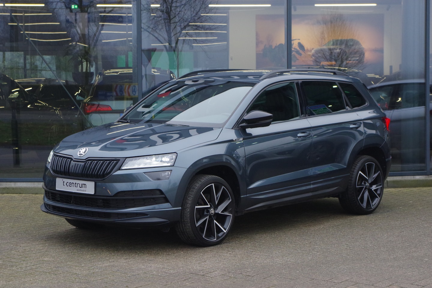 Skoda Karoq - 1.5 TSI ACT 150 Automaat Sportline BNS, Keyless, Adap. Cruise Control, Stoelverwarming - AutoWereld.nl