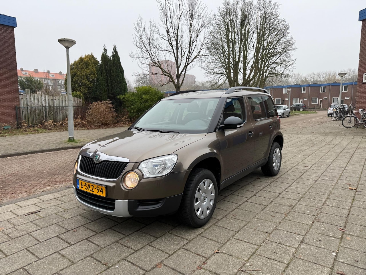 Skoda Yeti - 1.2 TSI Comfort Cruise Trekhaak Brown Metallic - AutoWereld.nl