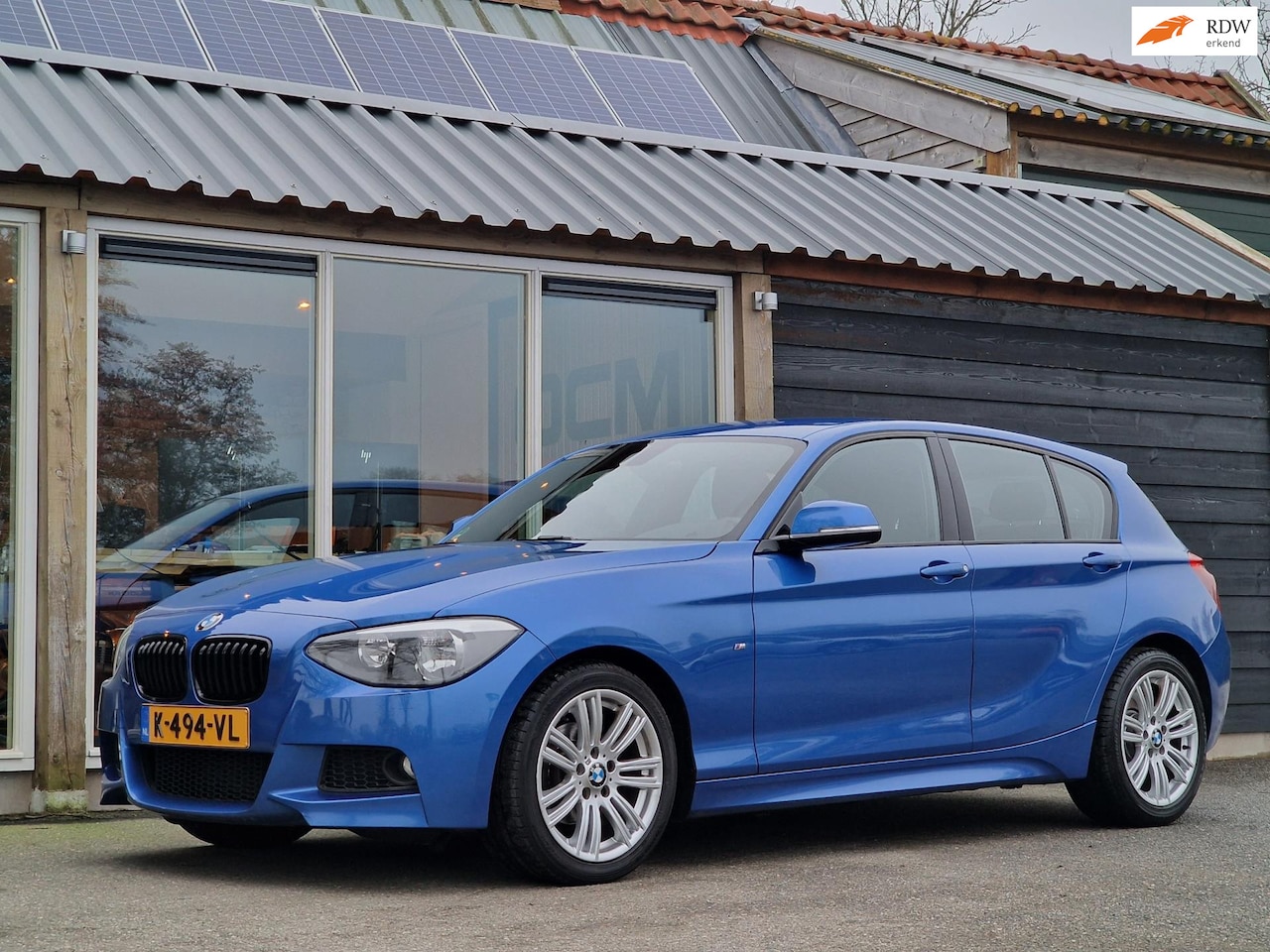 BMW 1-serie - 114i High Executive (M-Pakket / Sportstoelen / Climate / Bluetooth / Parkeersensoren / Dea - AutoWereld.nl