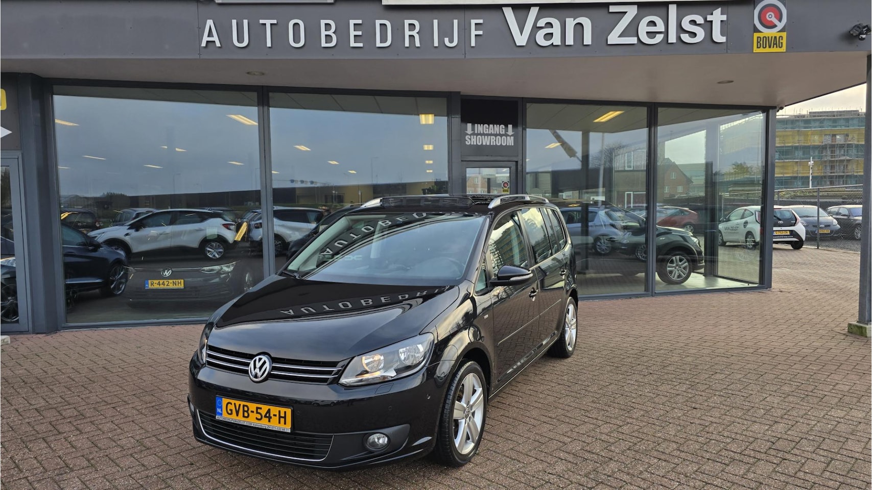 Volkswagen Touran - 1.4 TSI Highline 7p.*DSG*PANORAMA*Navigatie*Stoelverwarming*Cruise*Airco (automatisch)* Bo - AutoWereld.nl