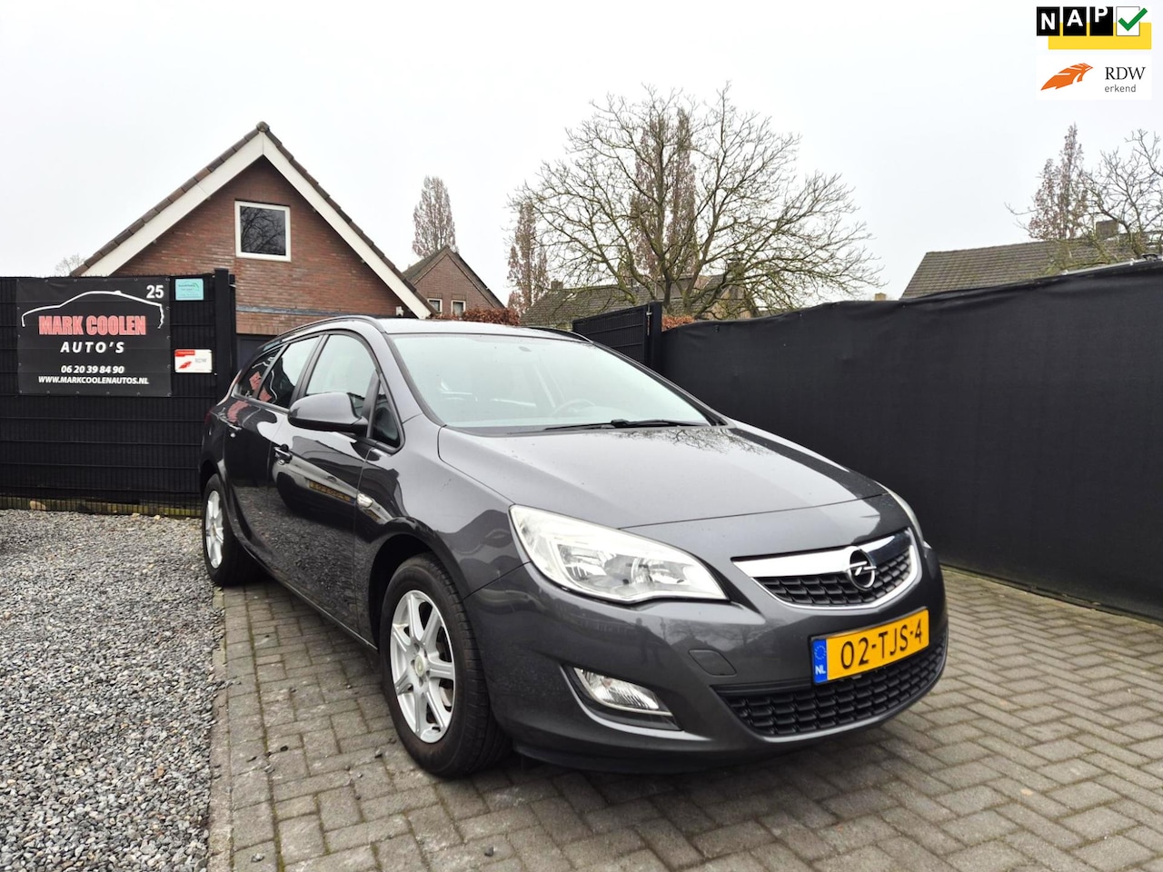 Opel Astra Sports Tourer - 1.4 Business Navi Airco Cruise - AutoWereld.nl