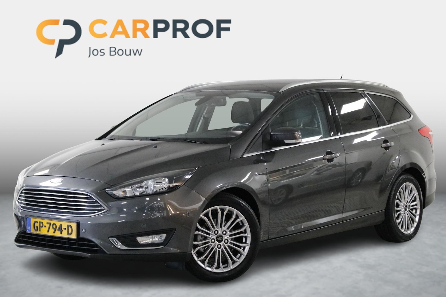 Ford Focus Wagon - 1.0 Titanium Edition Climate | Cruise | Navi | Bluetooth | NAP - AutoWereld.nl