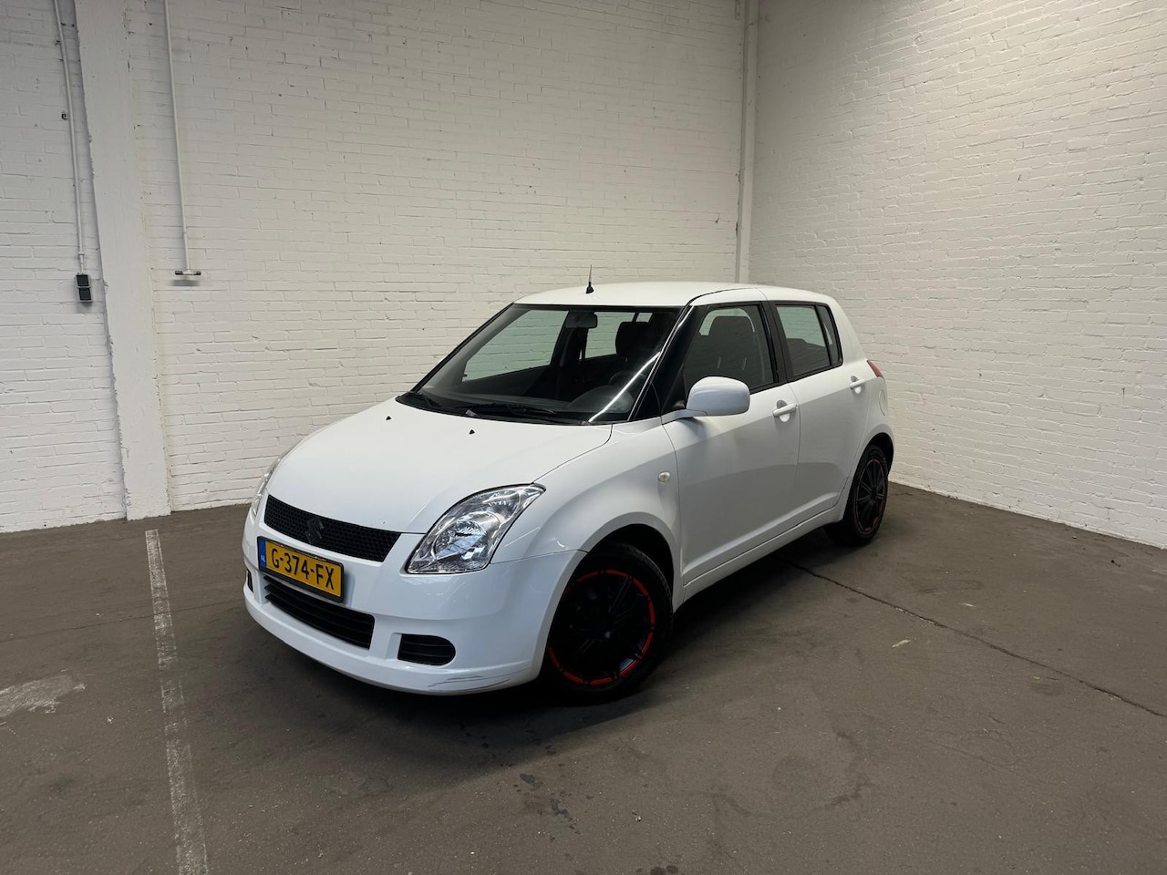 Suzuki Swift - 1.3 Base Bluetooth|Elektrische ramen|Elektrische ramen - AutoWereld.nl