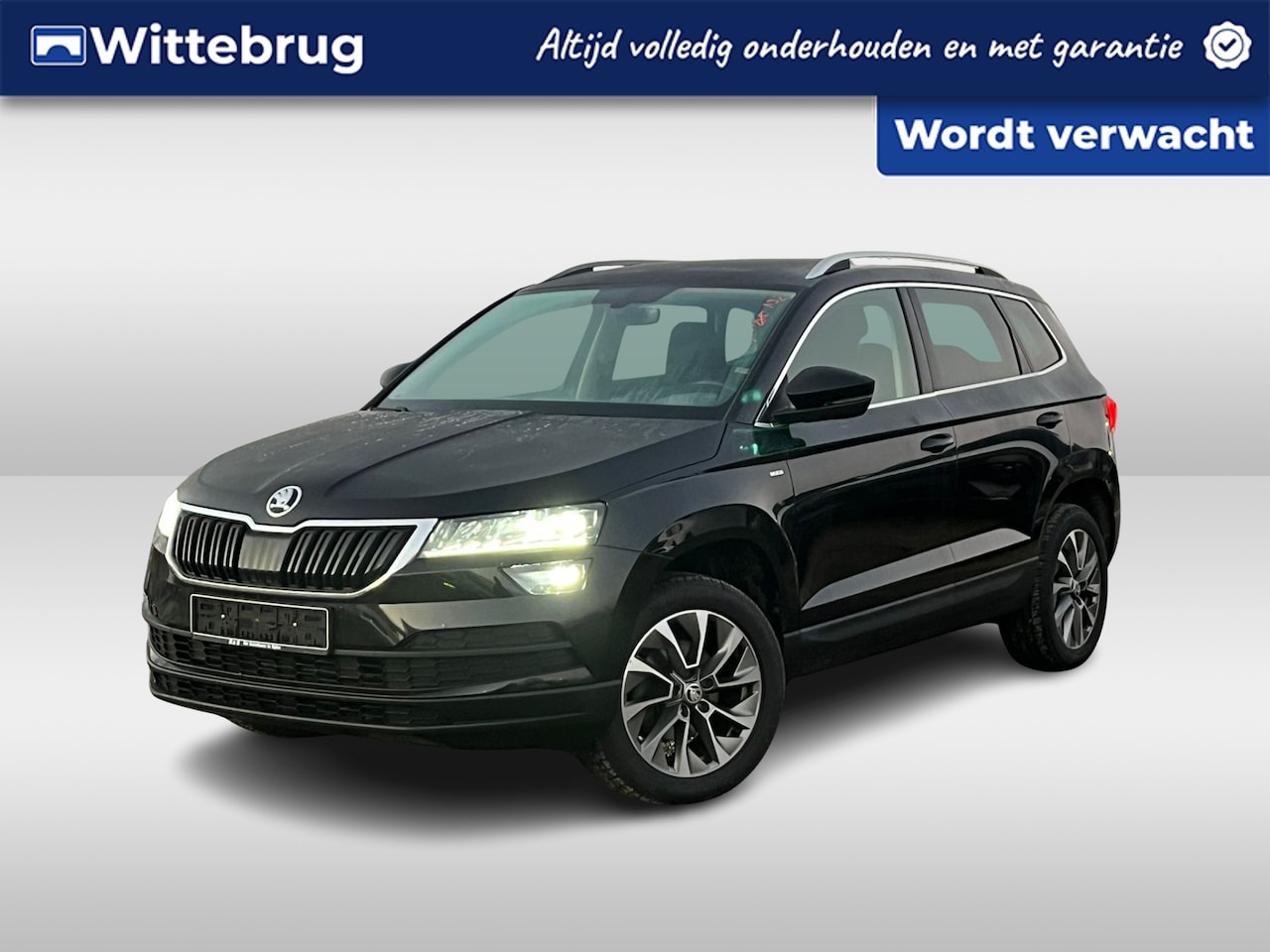 Skoda Karoq - 1.0 TSI 110PK Ambition Clever / Stoelverwarming V+A / Parkeersensoren Achter / App-Connect - AutoWereld.nl