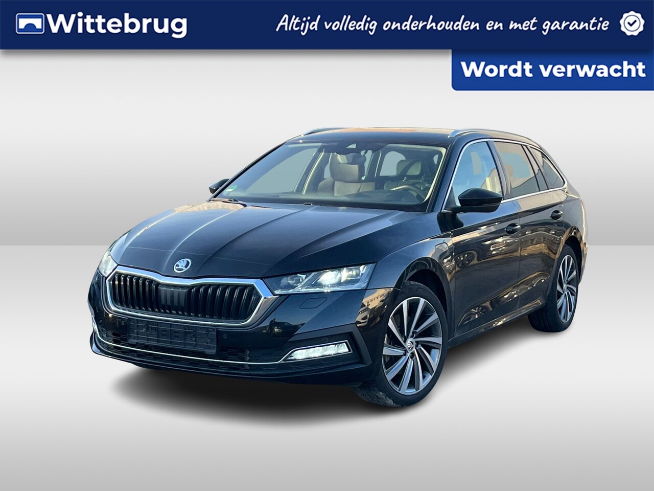 Skoda Octavia Combi - 1.4 TSI 204PK DSG iV PHEV Style / Digitale Cockpit / Stuur + Stoelverwarming V+A / Achteru - AutoWereld.nl