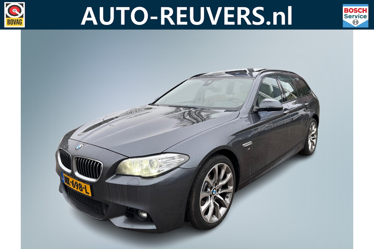 BMW 5-serie Touring - 520d M Sport Edition / Opendak / HUD / Leder / Navi / Trekhaak - AutoWereld.nl