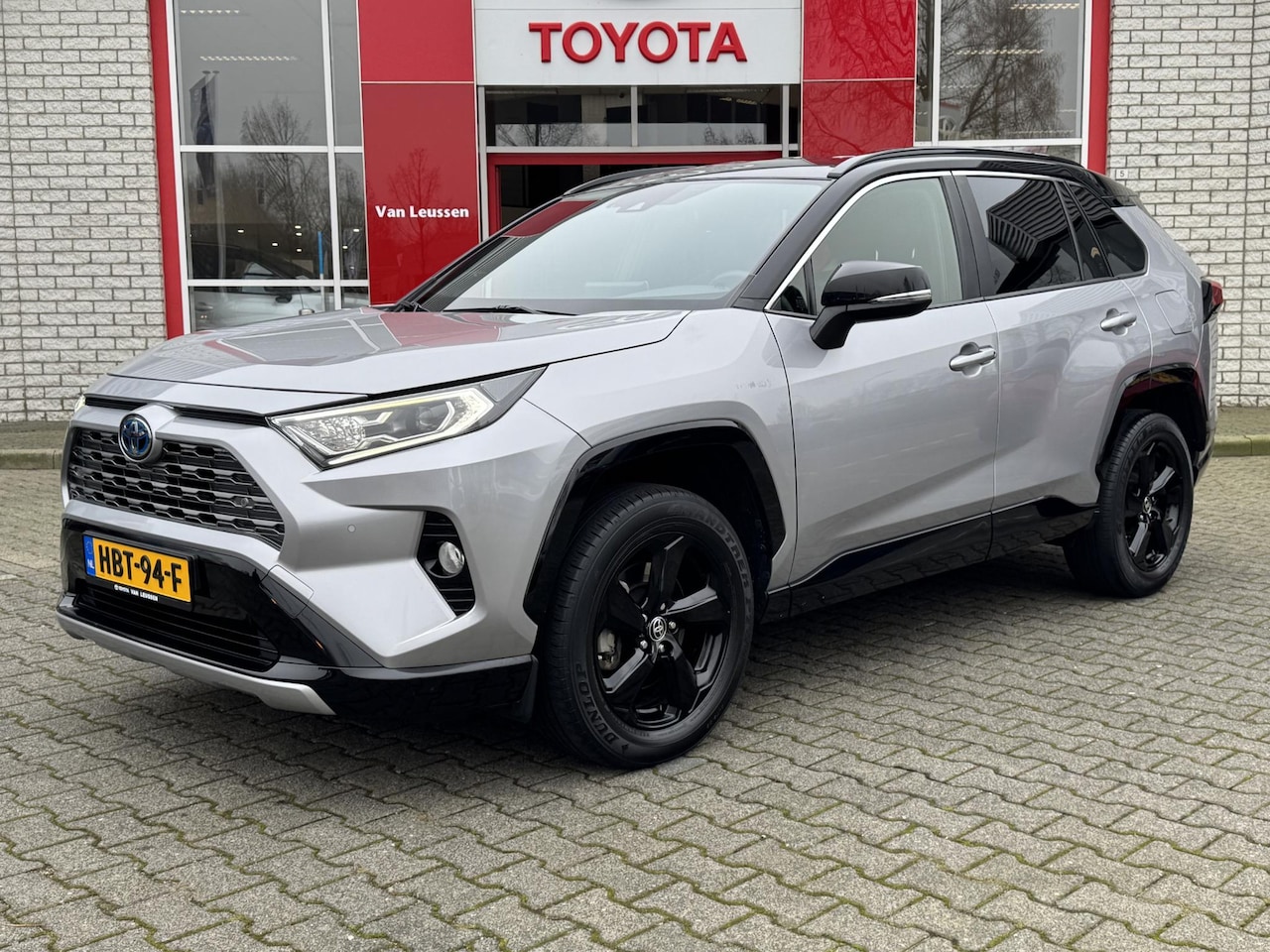 Toyota RAV4 - 2.5 HYBRID STYLE JBL-AUDIO KEYLESS EL-STOEL EL-ACHTERKLEP PARK-SENSOREN APPLE/ANDROID - AutoWereld.nl