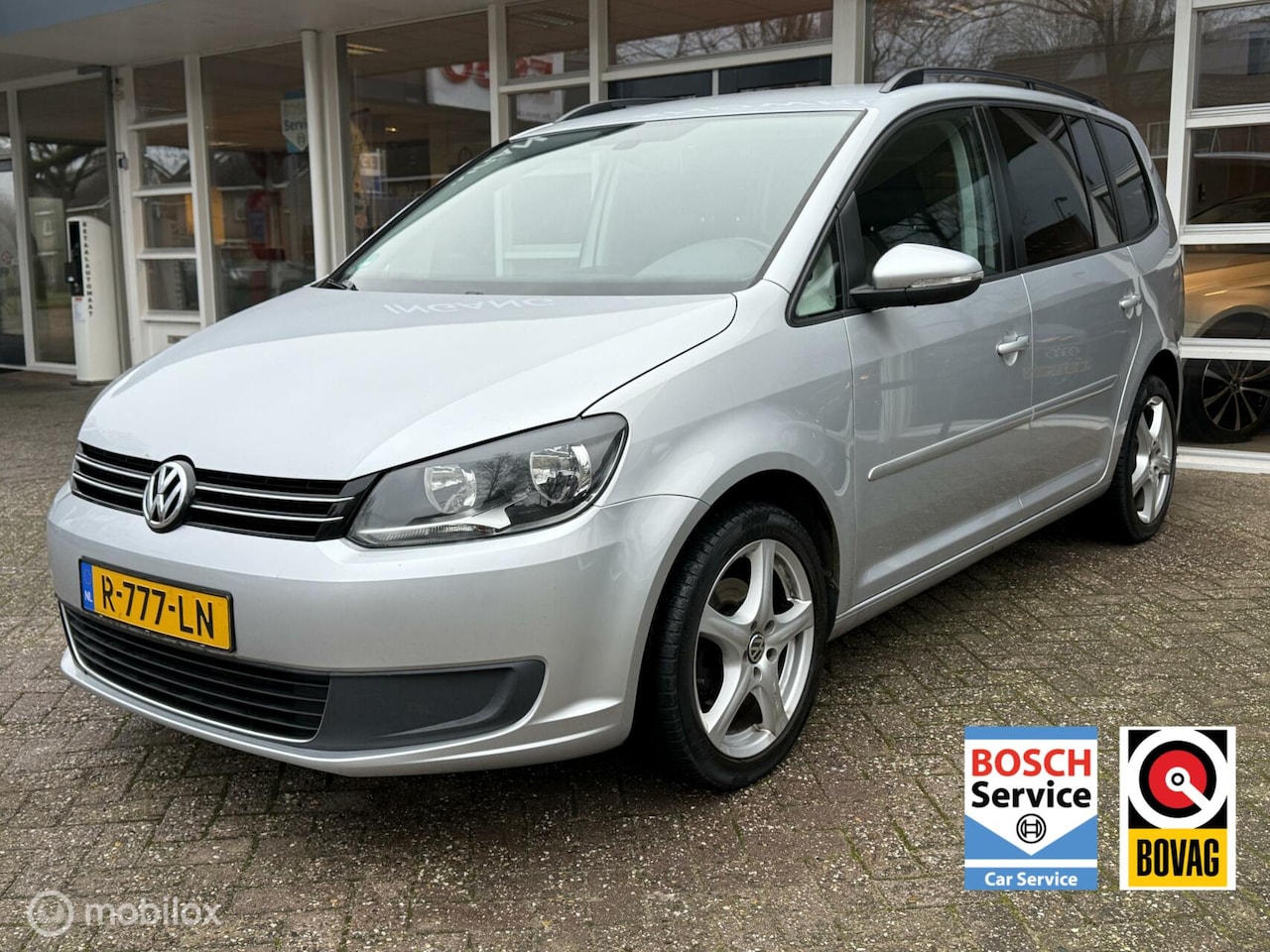 Volkswagen Touran - 1.4 TSI Comfortline 7p. Navi, Climat, Cruise, Pdc, Lm.. - AutoWereld.nl