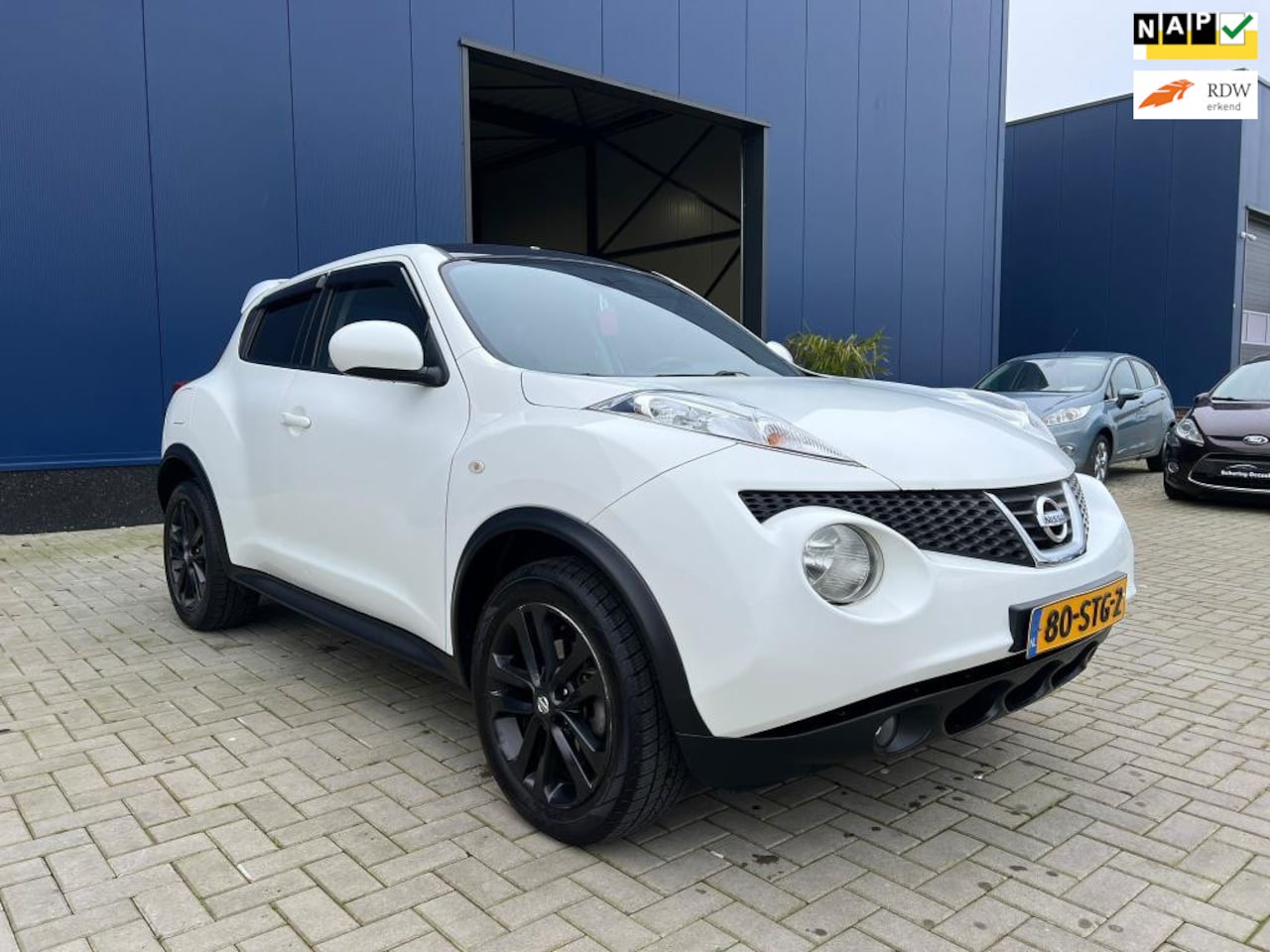 Nissan Juke - 1.6 Acenta Eco / CAMERA / NAVIGATIE / CRUISE CONTROL / CLIMATE CONTROL - AutoWereld.nl