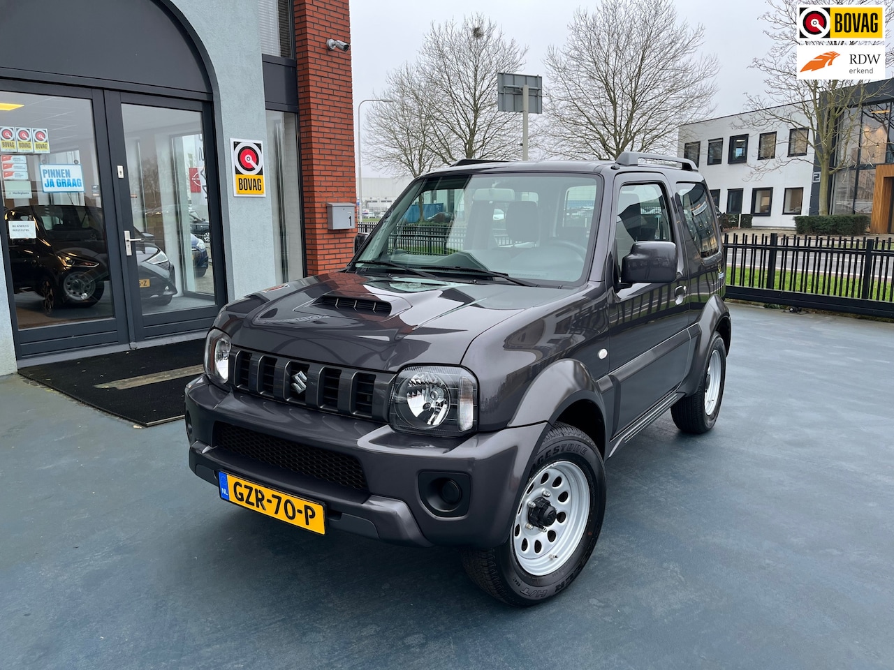 Suzuki Jimny - 1.3 Exclusive AUTOMAAT AIRCO TREKHAAK - AutoWereld.nl