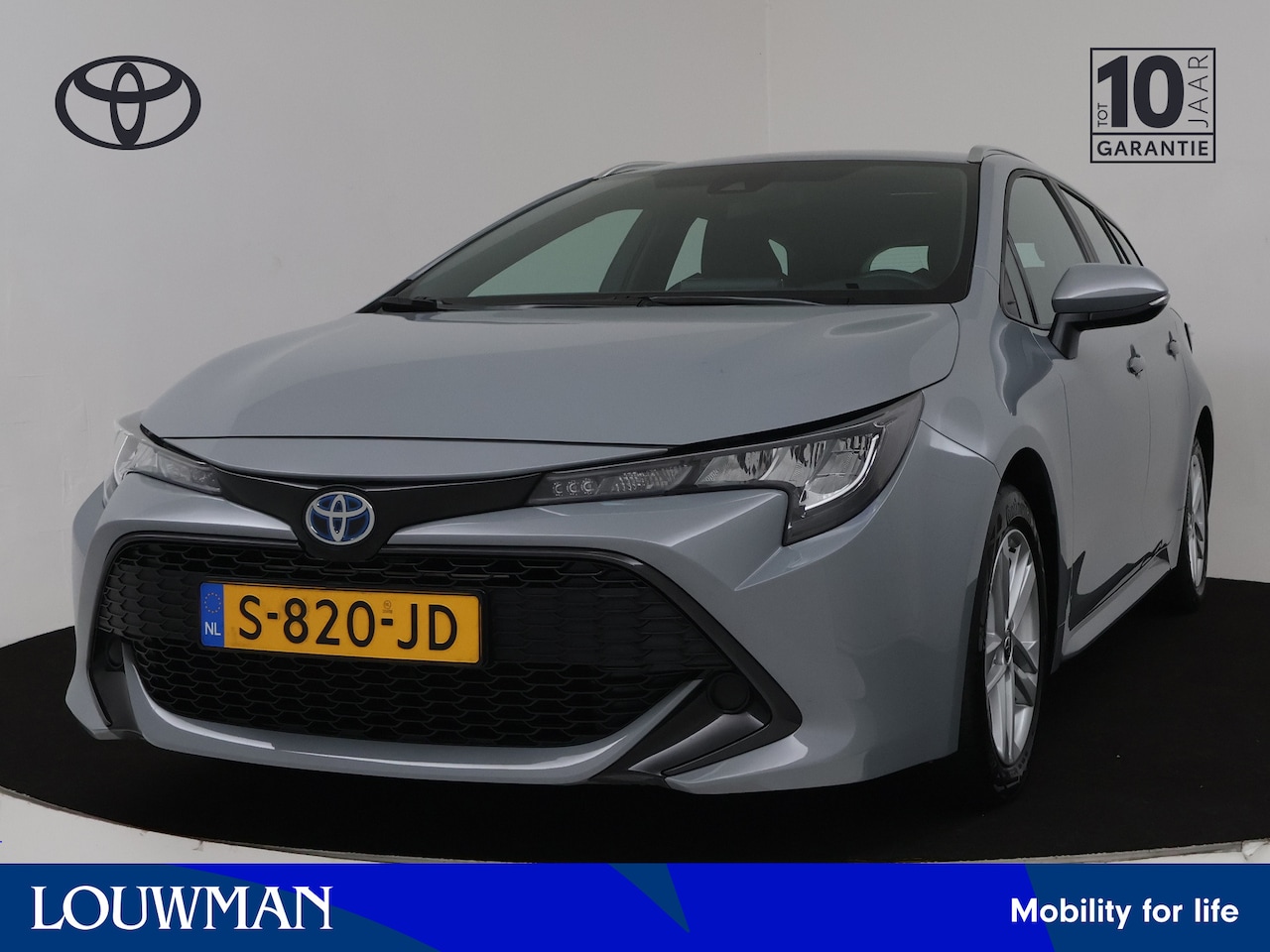 Toyota Corolla Touring Sports - 1.8 Hybrid Active | Navigatie | Climate Control | - AutoWereld.nl