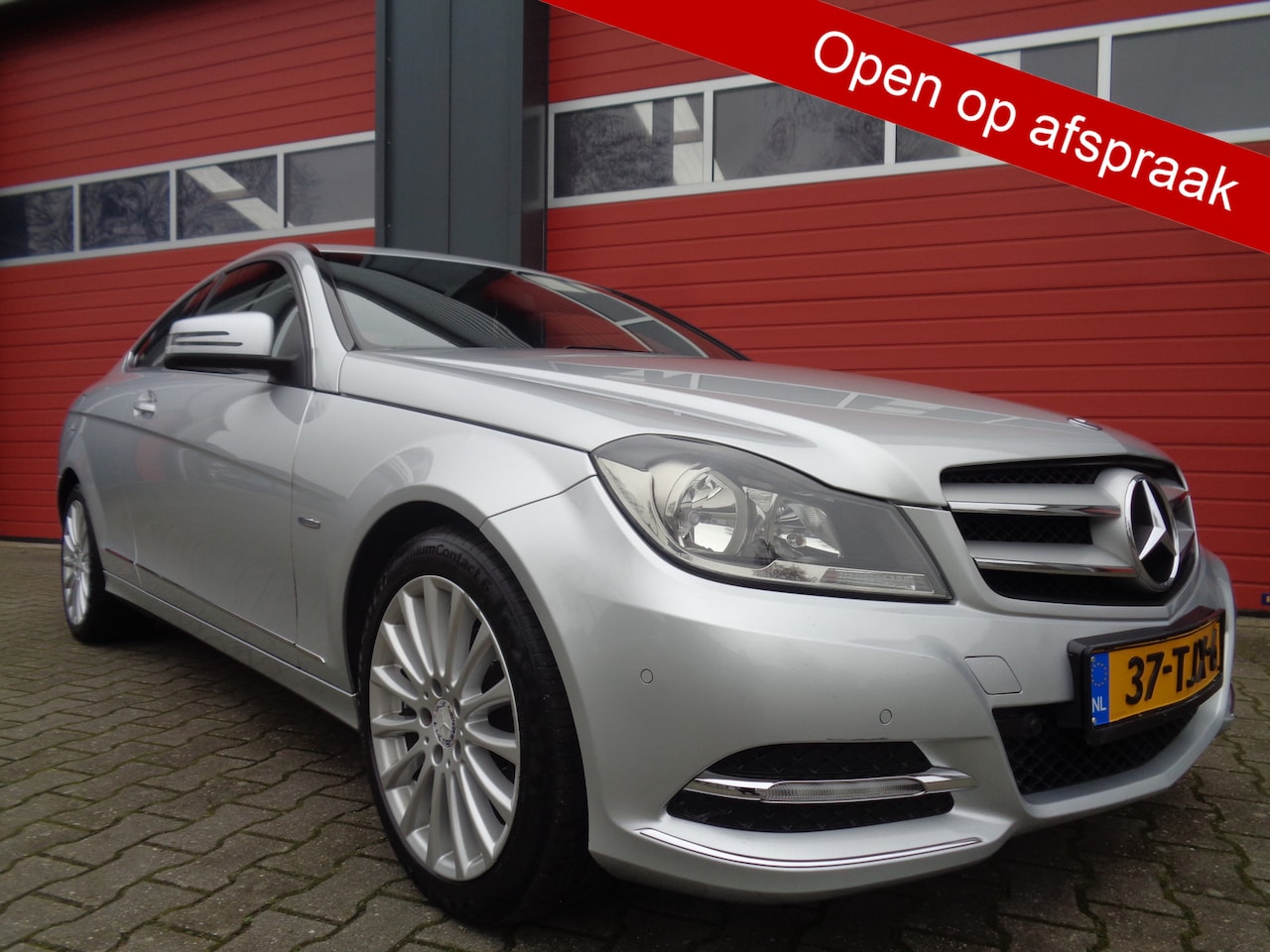 Mercedes-Benz C-klasse Coupé - 180 157PK Automaat Navi Clima Cruise LMV Leer NL-Auto !!! - AutoWereld.nl