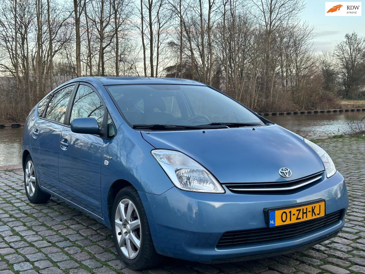 Toyota Prius - 1.5 VVT-i Comfort 2e eigenaar dealer onderhouden airco navigatie elektrische ramen trekhaa - AutoWereld.nl