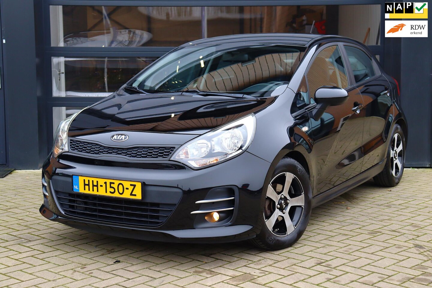 Kia Rio - 1.2 CVVT ComfortLine Facelift | Trekhaak | Airco | Cruise control | 100% Onderhouden | NAP - AutoWereld.nl