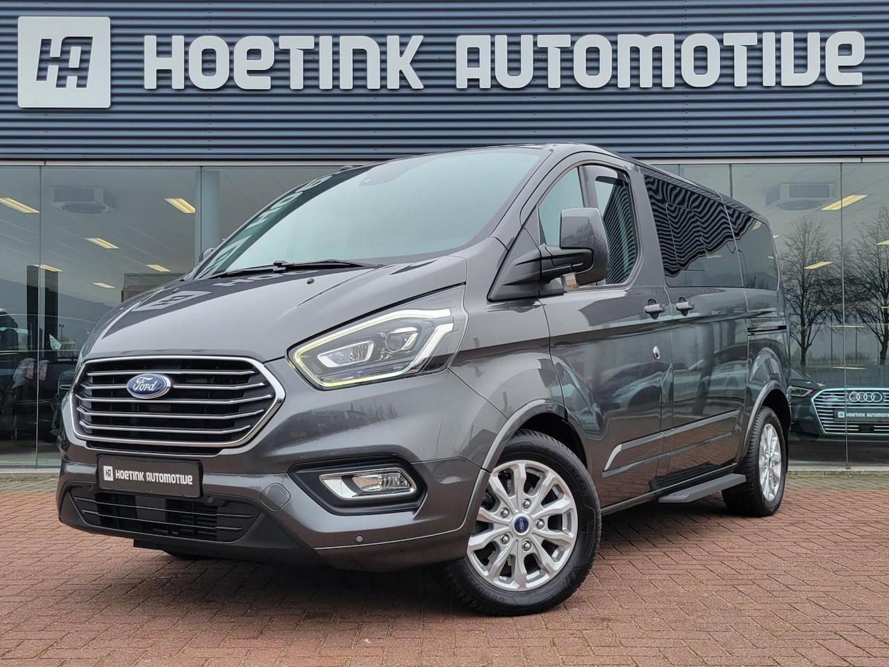 Ford Transit Custom Tourneo - 310 2.0 TDCI L1H1 Titanium AUT | 8 zits | Trekhaak | Airco | Navi - AutoWereld.nl