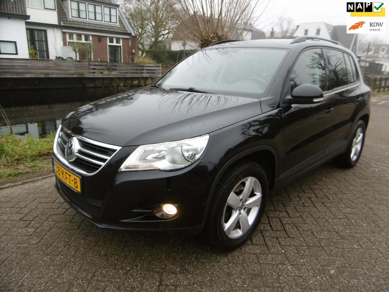 Volkswagen Tiguan - 1.4 TSI Comfort&Design 150pk Clima Cruise Navi Geen import - AutoWereld.nl