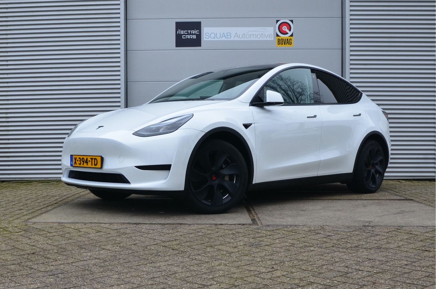 Tesla Model Y - RWD 58 kWh LFP accu (100% opladen), AutoPilot - AutoWereld.nl