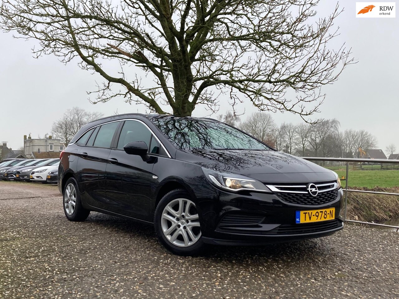 Opel Astra Sports Tourer - 1.0 Business+ | IntelliLink + Airco + Cruise + PDC nu € 8.450,-!! - AutoWereld.nl