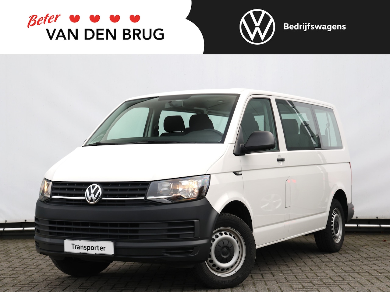 Volkswagen Transporter Kombi - 2.0 TDI L1H1 | Airco | PDC | Bluetooth | 9-Pers. BPM VRIJ!!! - AutoWereld.nl