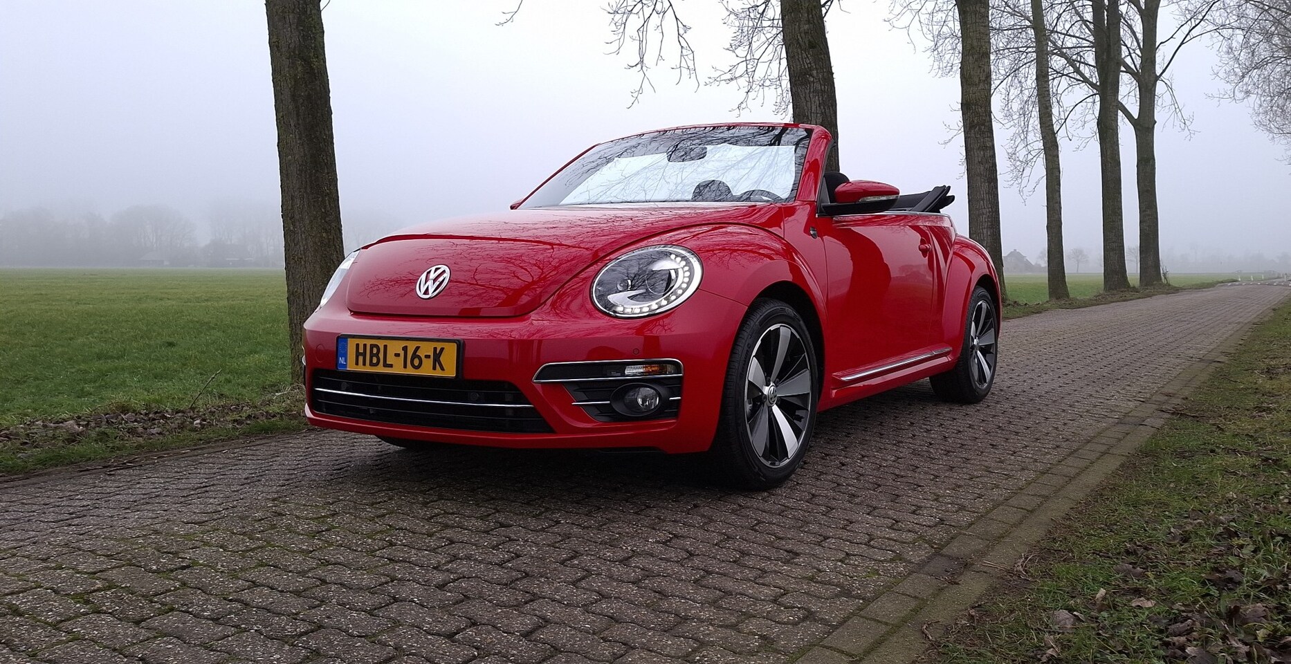 Volkswagen Beetle Cabriolet - 1.2 TSI Exclusive Series Sound - AutoWereld.nl