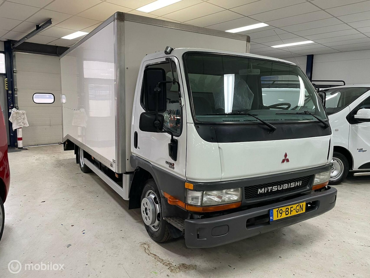 Mitsubishi Canter - Bakwagen Laadklep FB35 3.0 335 City Cab - AutoWereld.nl