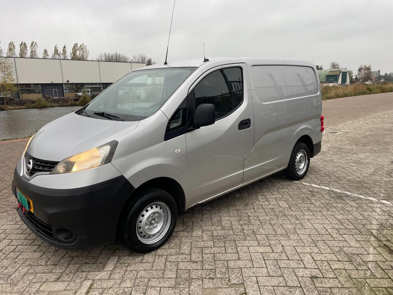 Nissan NV200 - 1.5 dCi Acenta!AIRCO!WEINIG KM:160261!AIRCO!ELECKRISH RAAM&SPIEGEL!BANDEN GOED!ACHTERUIT C - AutoWereld.nl