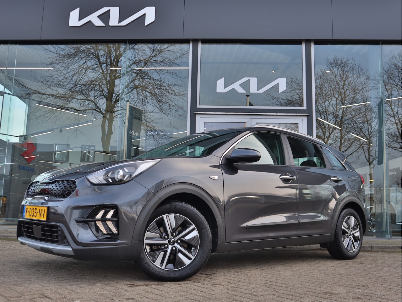 Kia Niro - 1.6 GDi Hybrid DynamicLine ECC Cr.Control Navi+Camera+BT PDC stoel/stuurverw. 7jr.Garantie - AutoWereld.nl