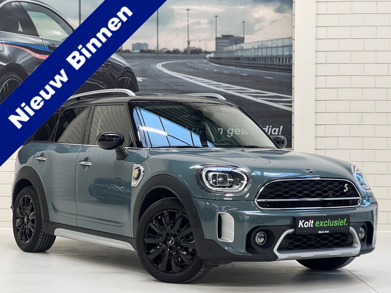 MINI Countryman - Mini 2.0 Cooper S E ALL4 ALL4 220 PK Automaat / Plug In / Panoramadak / Leder Cross Punch - AutoWereld.nl