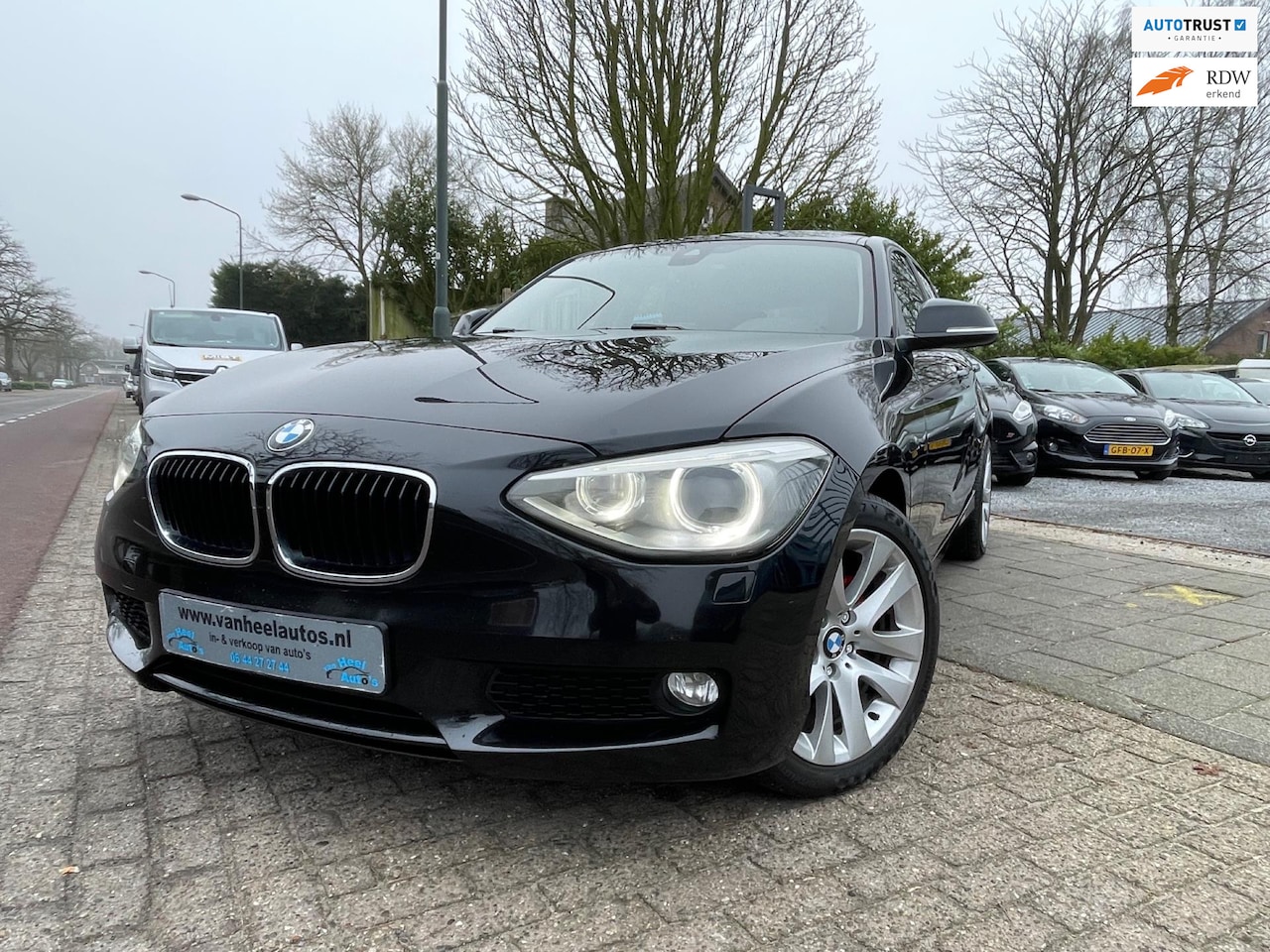 BMW 1-serie - 116i Aut Clima Elek Pakket Lmv Navi Xenon Cruise - AutoWereld.nl