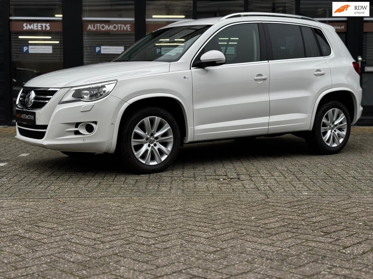 Volkswagen Tiguan - 2.0 TSI Sport&Style 4Motion - AutoWereld.nl