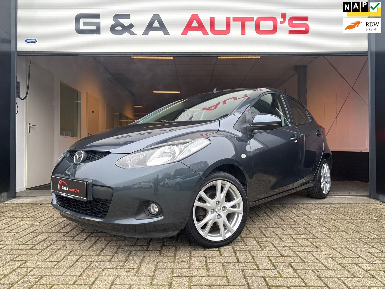 Mazda 2 - 1.3 SPORT / AIRCO / STOELVERW / ELLEKT-PAKKET / LMV - AutoWereld.nl