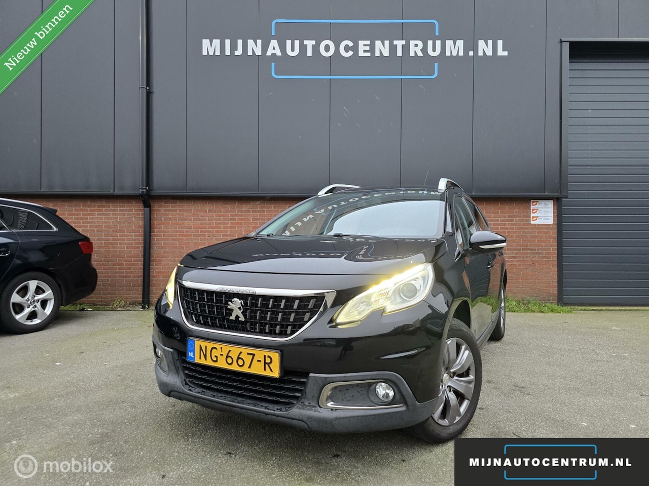 Peugeot 2008 - 1.2 PureTech Blue Lion / NAP / NAVI / AIRCO - AutoWereld.nl